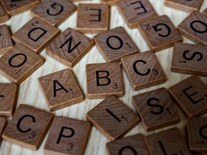 Wooden scrabble tiles spelling ABC